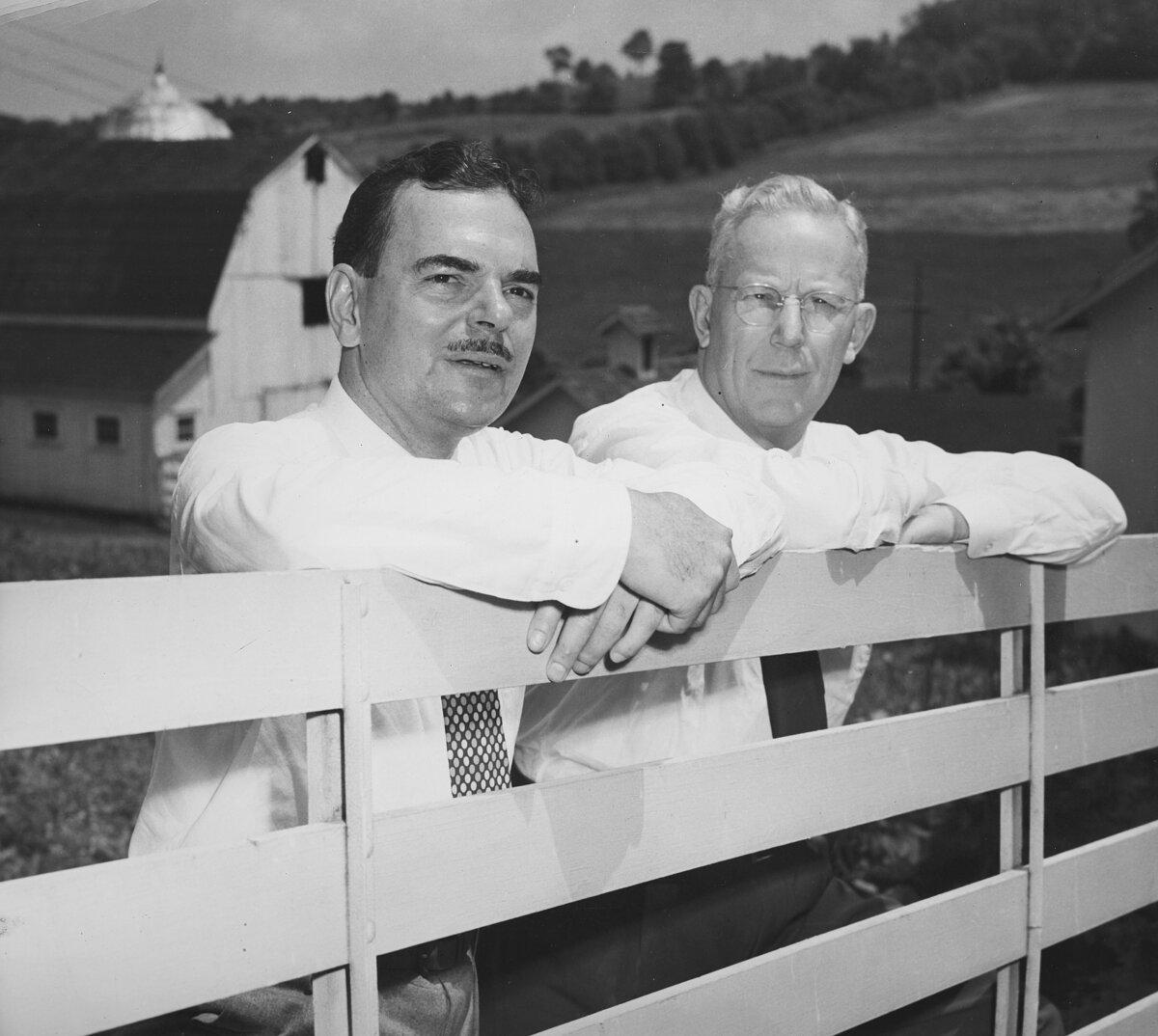 New York Gov. and Republican presidential candidate Thomas E. Dewey (L) and his running mate California Gov. Earl Warren lean on a fence at Dewey's farm in Pawling, N.Y., on July 2, 1948. (Al Gretz/FPG/Getty Images)