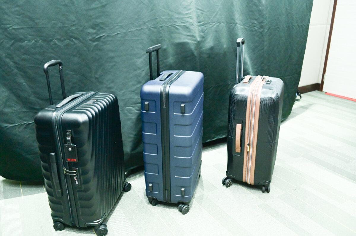 The suitcase samples shown are (L-R) TUMI, Muji, and Delsey Paris St. Tropez 24-inch. (Bill Cox/The Epoch Times)