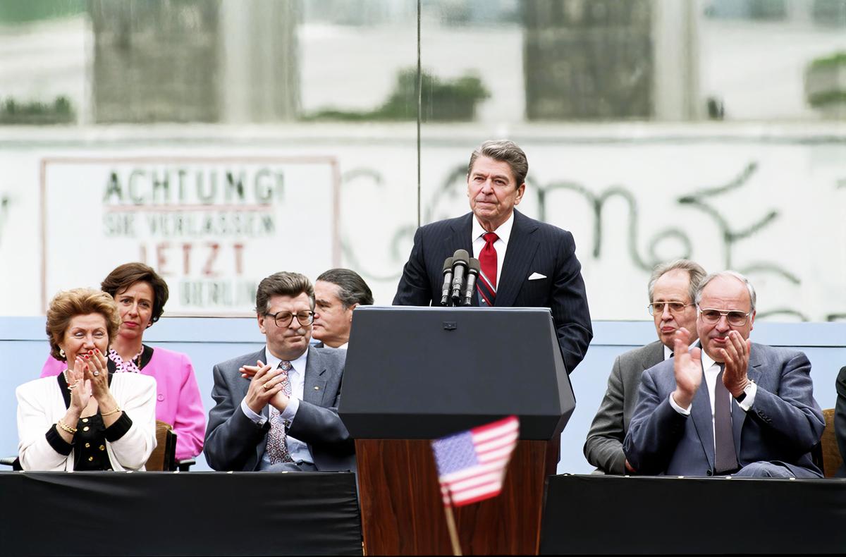 President Ronald Reagan gives his famous speech, urging, "Mr. Gorbachev, tear down this wall!" at the Brandenburg Gate in Berlin, Germany, on June 12, 1987. (Ronald Reagan Presidential Library & Museum)