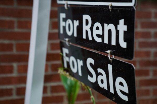 A "For Rent, For Sale" sign outside of a home in Washington on July 7, 2022. (Sarah Silbiger/Reuters)