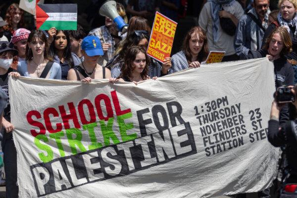 Protesters march holding a School Strike for Palestine banner on Nov. 23, 2023 in Melbourne, Australia. (Photo by Asanka Ratnayake/Getty Images)