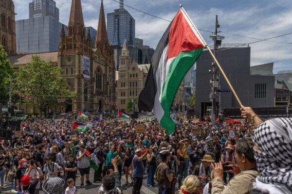 Protesters gather at Flinders Street Station on Nov. 23, 2023 in Melbourne, Australia. The ongoing Israel-Hamas conflict continues to cause social tensions in societies around the world, including in Australian cities. (Photo by Asanka Ratnayake/Getty Images)