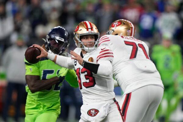 San Francisco 49ers quarterback Brock Purdy throws during the first half of an NFL football game against the Seattle Seahawks in Seattle on Nov. 23, 2023. (Stephen Brashear/AP Photo)