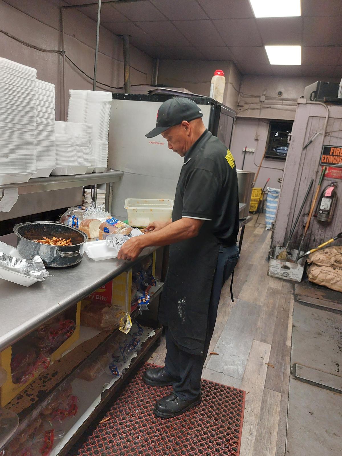 Mr. Vance Whitmore has been working in the Whitmore's Bar-B-Q kitchen for 50 years, since he was a teenager. (Kevin Revolinski)
