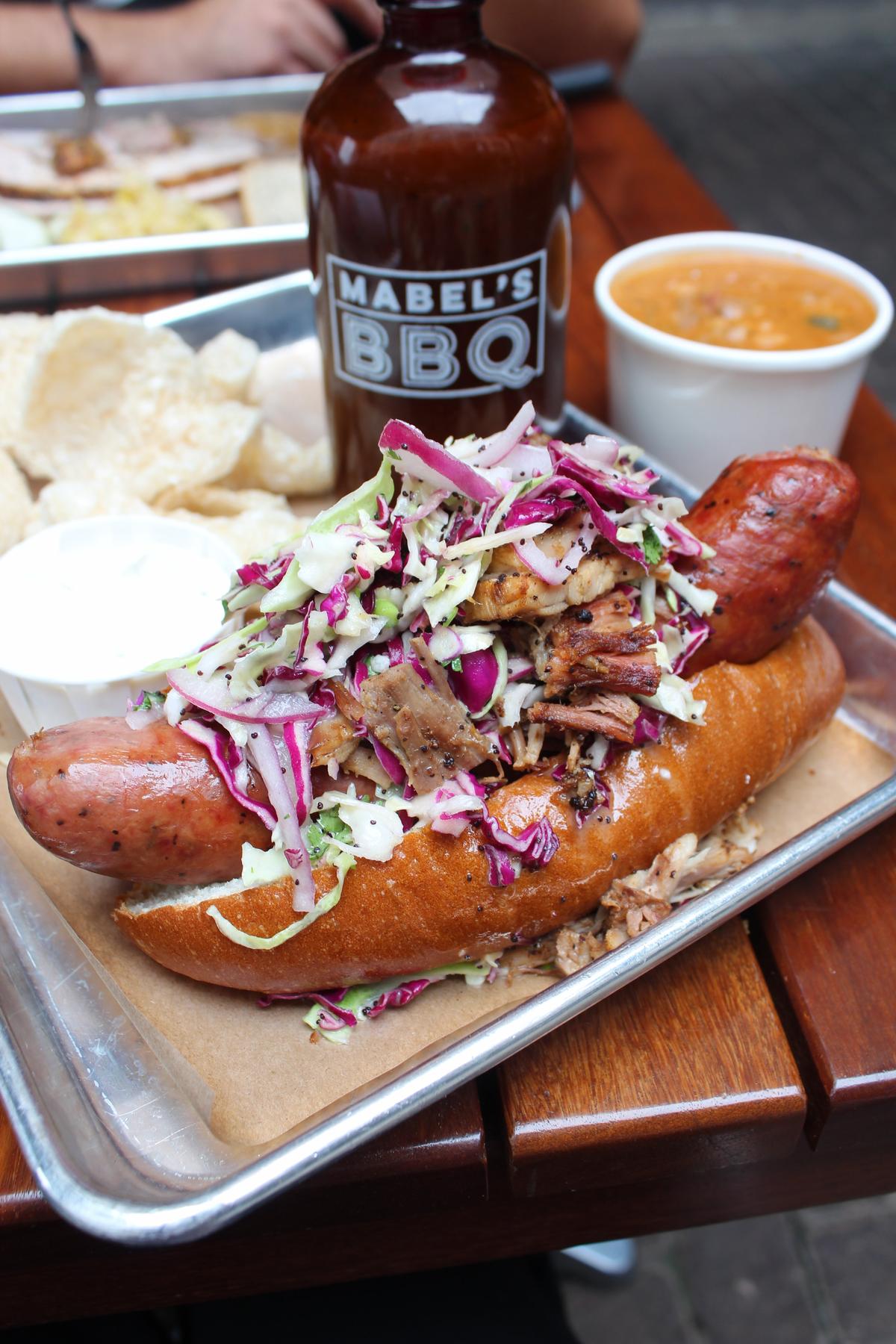 The Polish Girl at Mabel's BBQ replaces the fries with pulled pork. (Courtesy of Destination Cleveland)