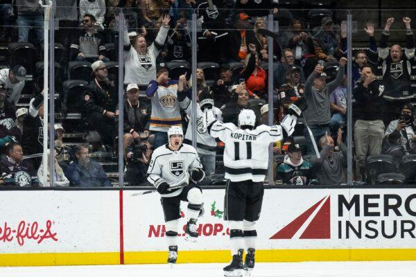 Los Angeles Kings left wing Kevin Fiala (22) celebrates his goal with center Anze Kopitar (11) during the first period of an NHL hockey game against the Anaheim Ducks, in Anaheim, Calif., on Nov. 24, 2023. (Kyusung Gong/AP Photo)
