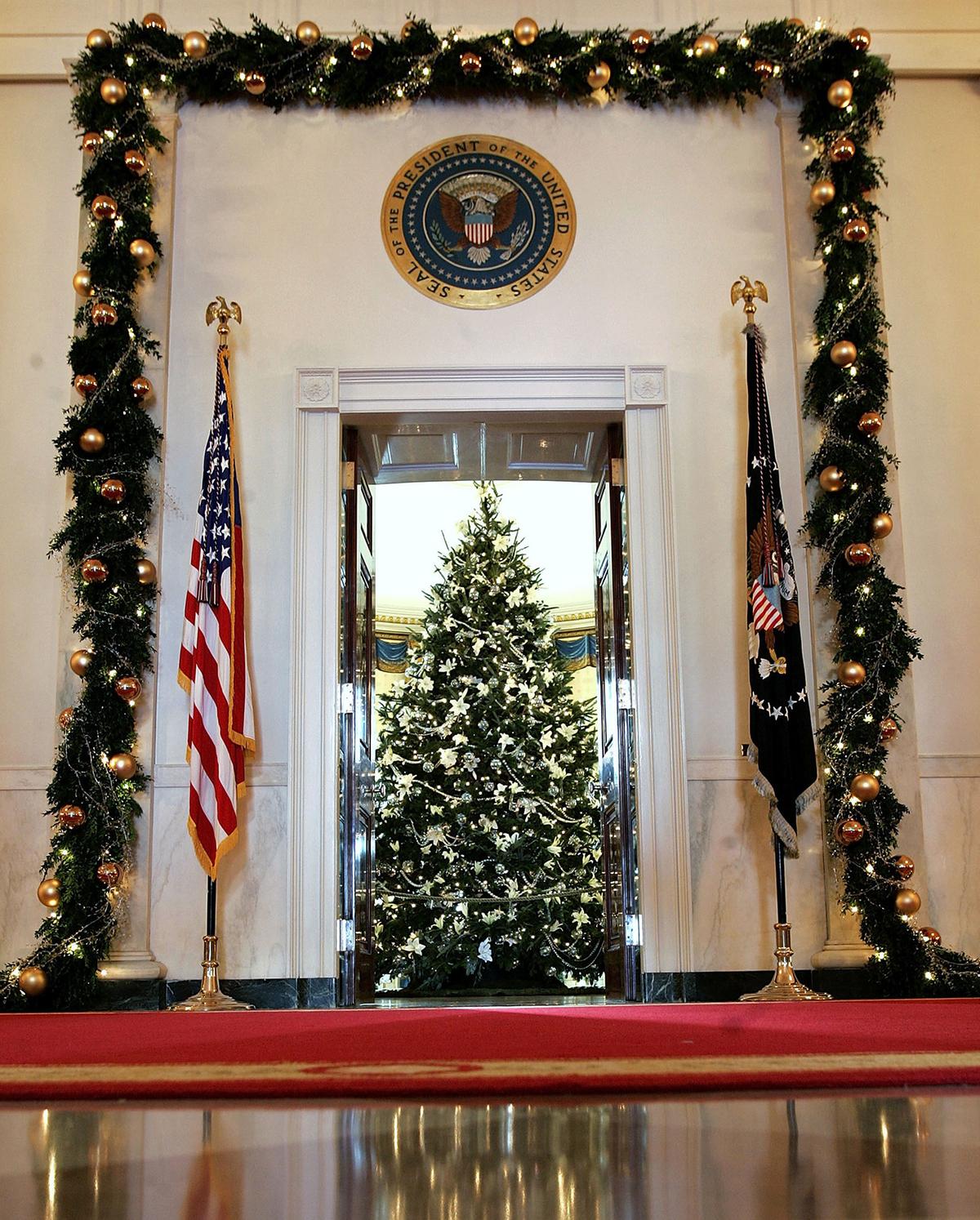 The media preview of the holiday decorations and tasting event in the Blue Room of the White House on Nov. 30, 2005. (Chip Somodevilla/Getty Images)