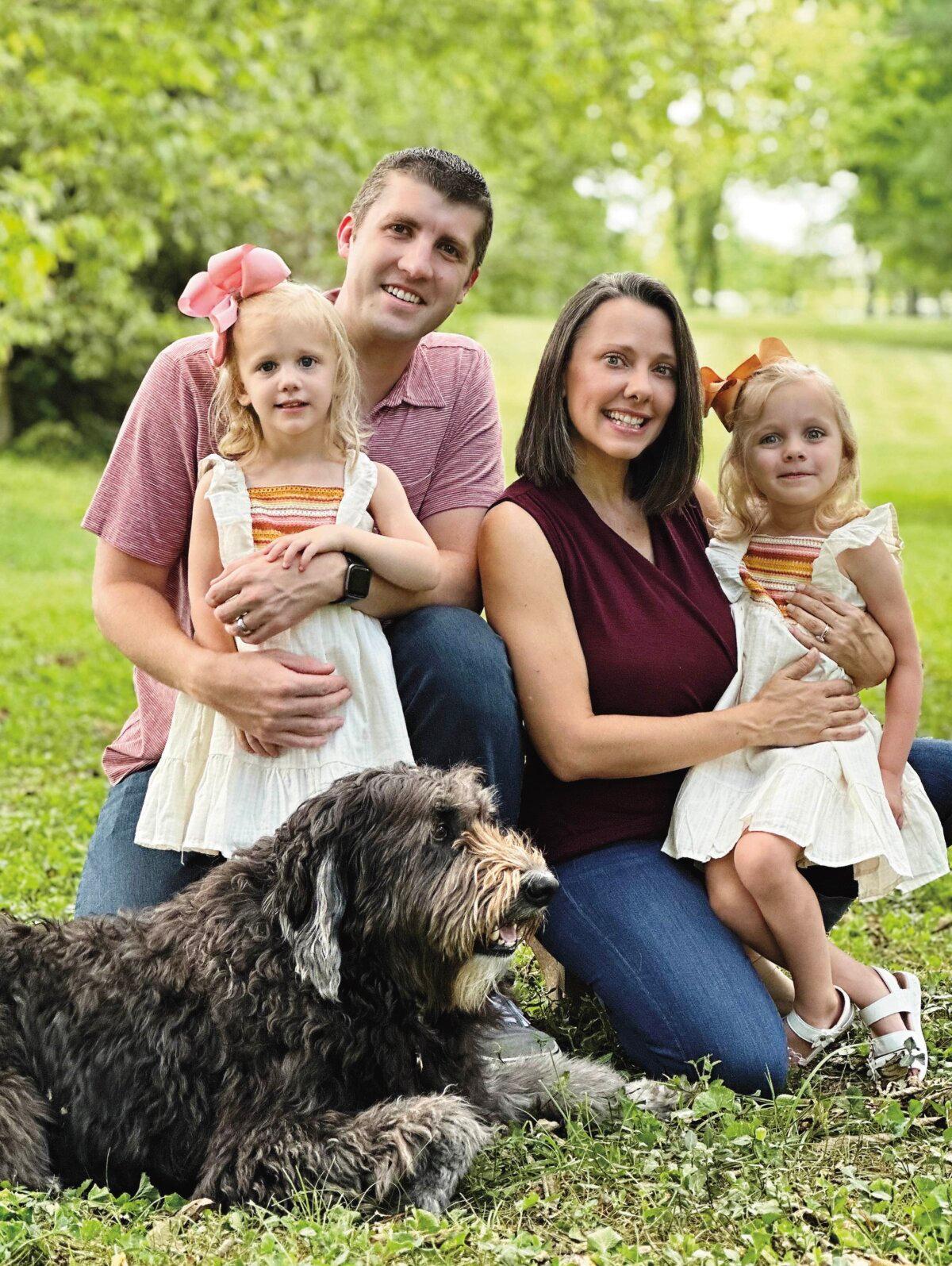 Executive director of the Kentucky branch of Refuge for Women Deanna Lynn with her husband and twin daughters. (Courtesy of Deanna Lynn)