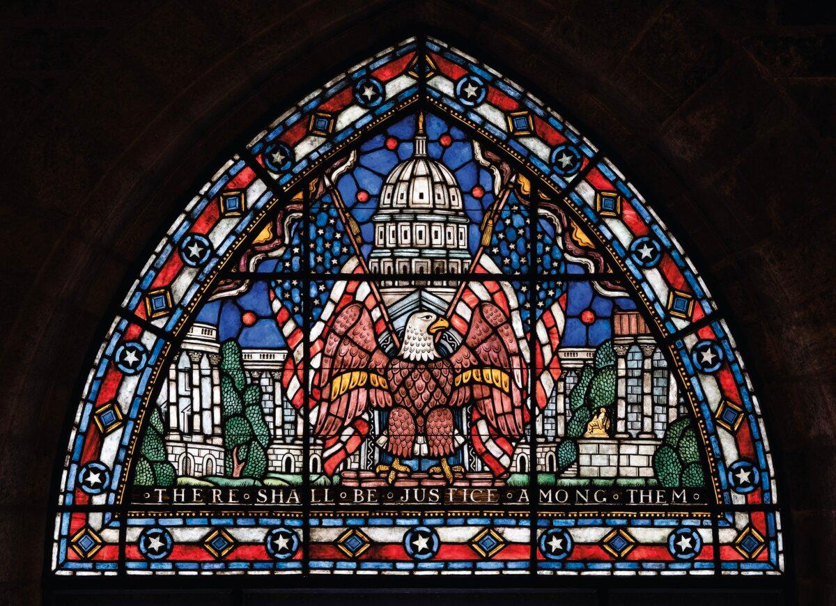A stained glass window with patriotic symbols at the Glencairn Museum in Pennsylvania. (Glencairn Museum, Bryn Athyn, Pa.)