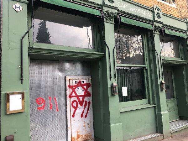 An image taken from the Twitter feed of Oliver Cooper, showing anti-Semitic graffiti on a shop in Hampstead, north London on Dec. 29, 2019. (Oliver Cooper/X/PA Media)