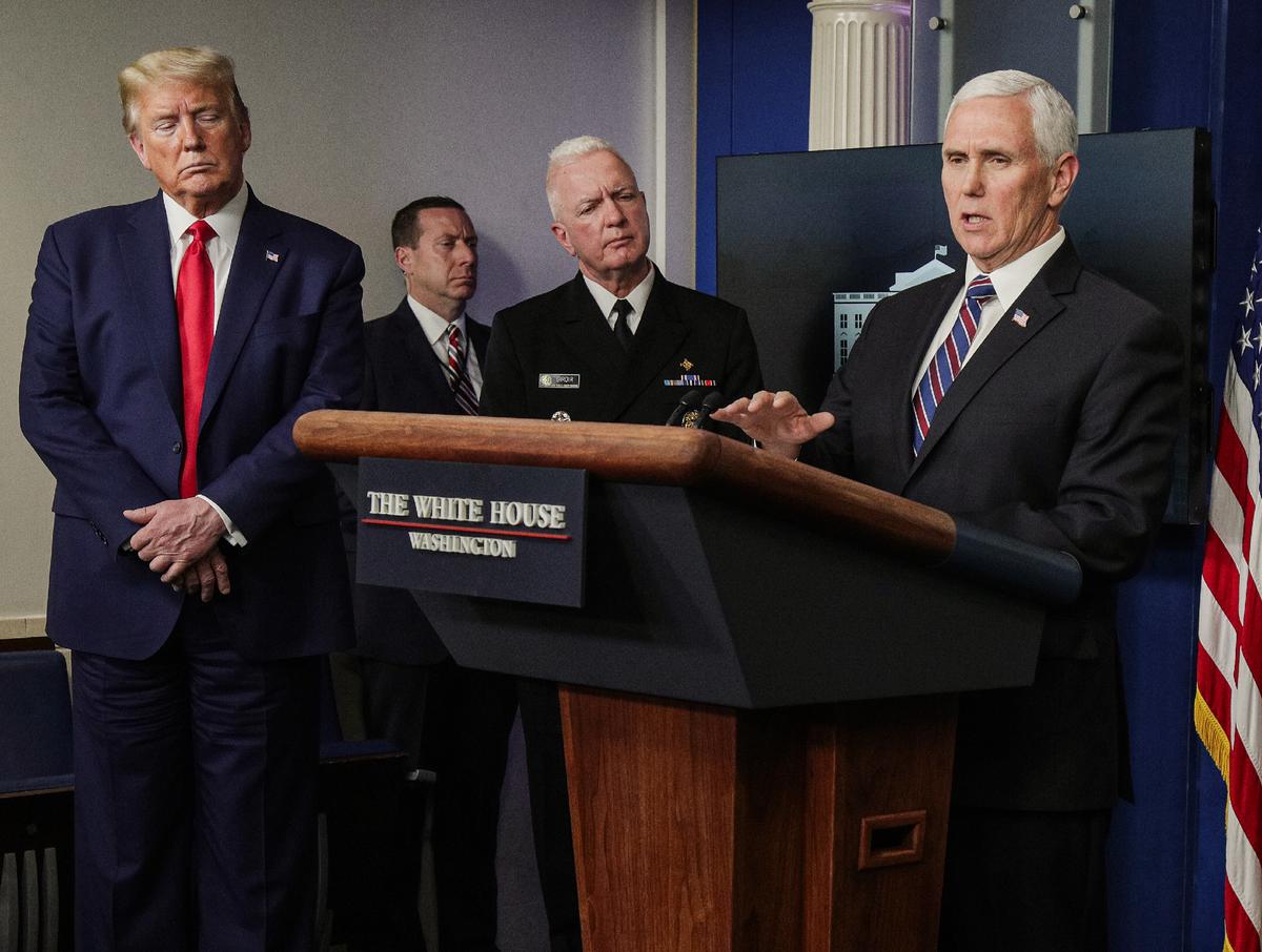 President Donald Trump and Adm. Brett Giroir (C), assistant secretary of Health and Human Services, look on as Vice President Mike Pence (R) speaks at the daily coronavirus briefing at the White House on April 20, 2020. (Alex Wong/Getty Images)