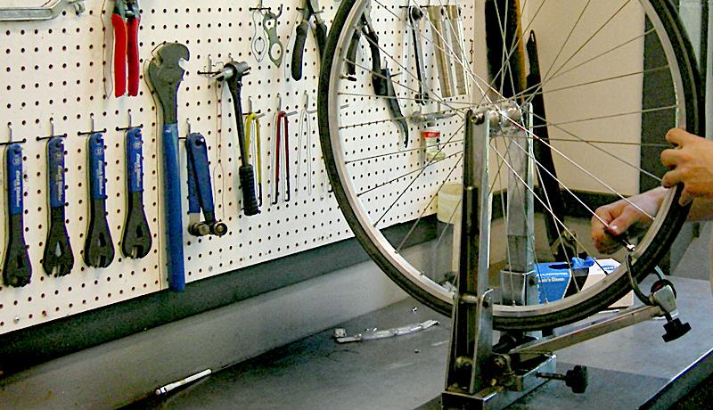 An employee at E-Bikes of Holmes County in Ohio works on an e-bike. (Courtesy of David Mullett)