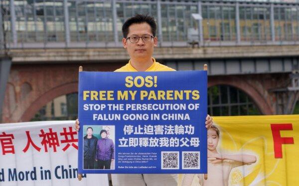 Ding Yuande's Son, Ding Lebin appeals for the release of his parents who are imprisoned in China for practicing Falun Gong, during a rally on Aug. 1, 2023. (The Epoch Times)
