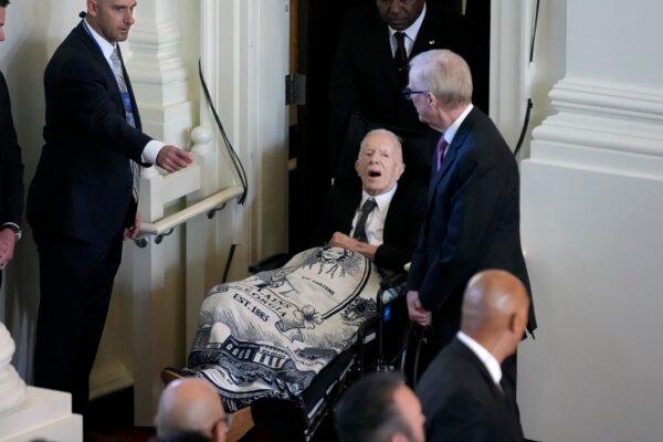 Former President Jimmy Carter arrives to attend a tribute service for his wife and former first lady Rosalynn Carter, at Glenn Memorial Church in Atlanta on Nov. 28, 2023. (Andrew Harnik/AP Photo)