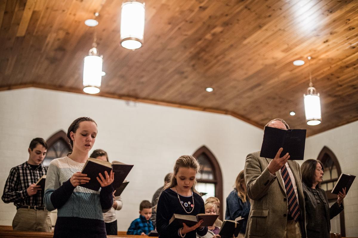  People sing hymns at Grace Orthodox Presbyterian Church during a Sunday evening service in Lynchburg, Va., on Jan. 17, 2016. (NICHOLAS KAMM/AFP via Getty Images)