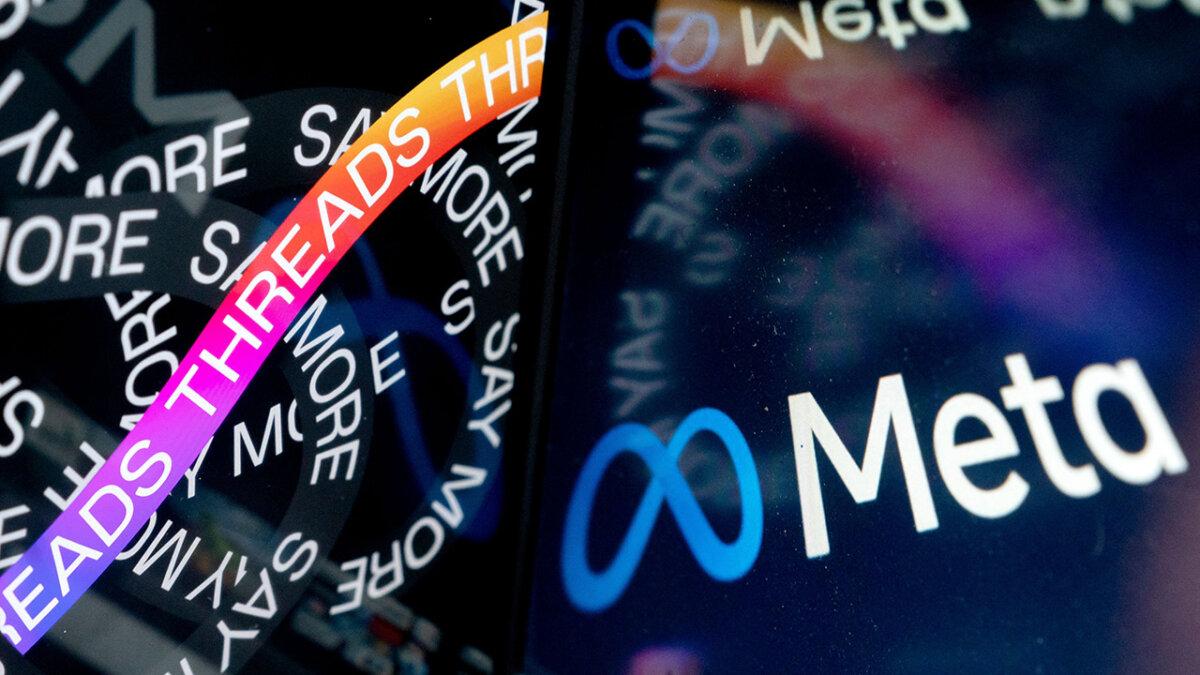 This photo illustration created in Washington, D.C., on July 6, 2023, shows the opening page of Threads, an Instagram app, near the Meta logo. (Stefani Reynolds/AFP via Getty Images)