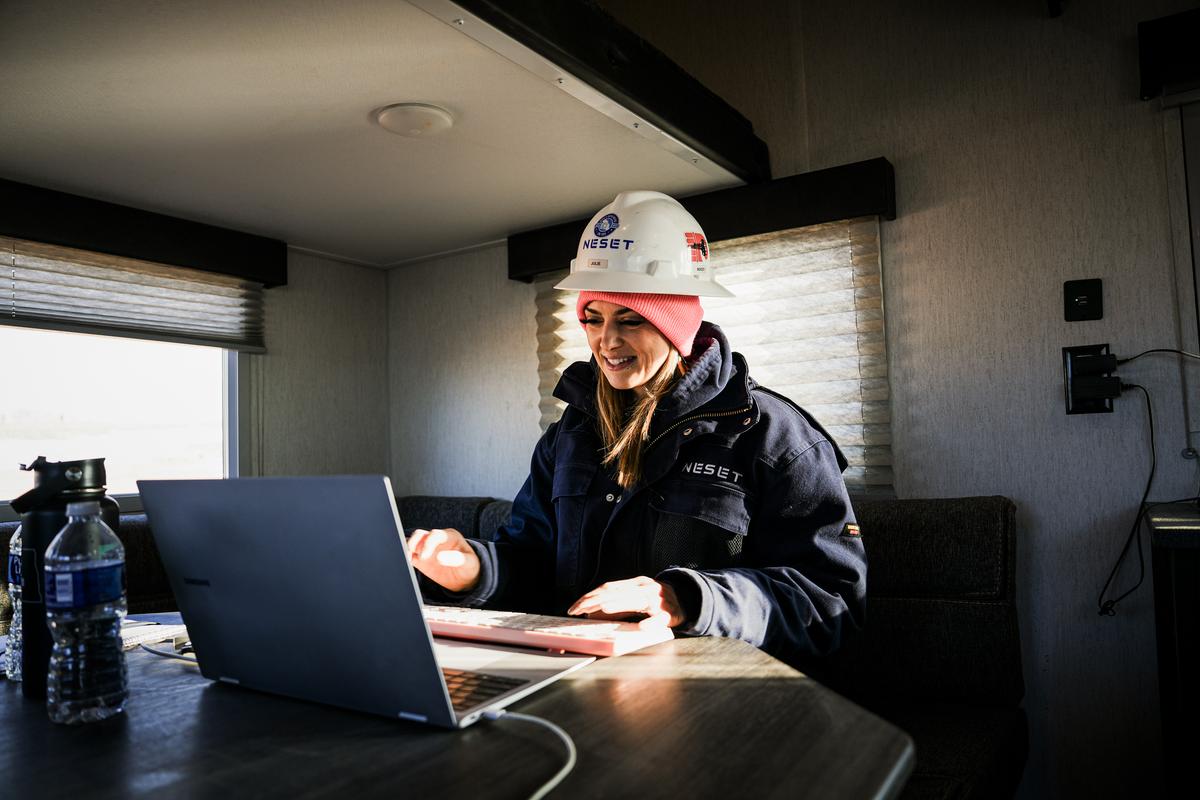 Julie Byron, a gate guard with Neset Consulting Service, at her desk in Tioga, N.D., on Dec. 20, 2023. (Madalina Vasiliu/The Epoch Times)