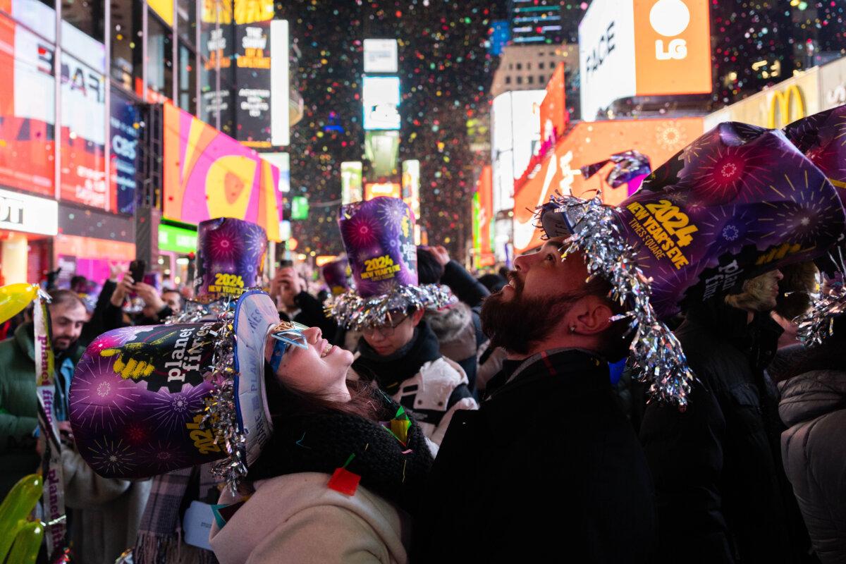 Revelers celebrate New Year's in Times Square in New York on Jan. 1, 2024. (Adam Gray/Getty Images)