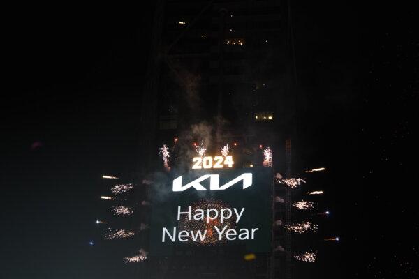 World Celebrates the Arrival of 2024 | USNN World News  Revelers celebrate New Year's Eve in Times Square in New York on Jan. 1, 2024. (Adam Gray/Getty Images)