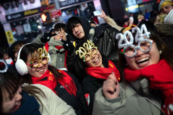  Revelers wait for the New Year's Eve celebrations in Times Square in New York City on Dec. 31, 2023. (Adam Gray/Getty Images)