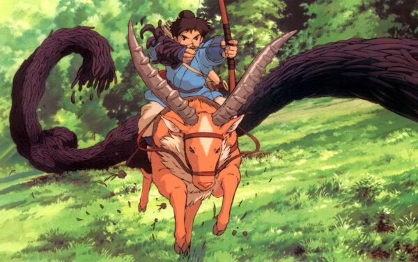 Ashitaka (voiced by Billy Crudup) defends his village against an angry monster, in “Princess Mononoke.” (Studio Ghibli)