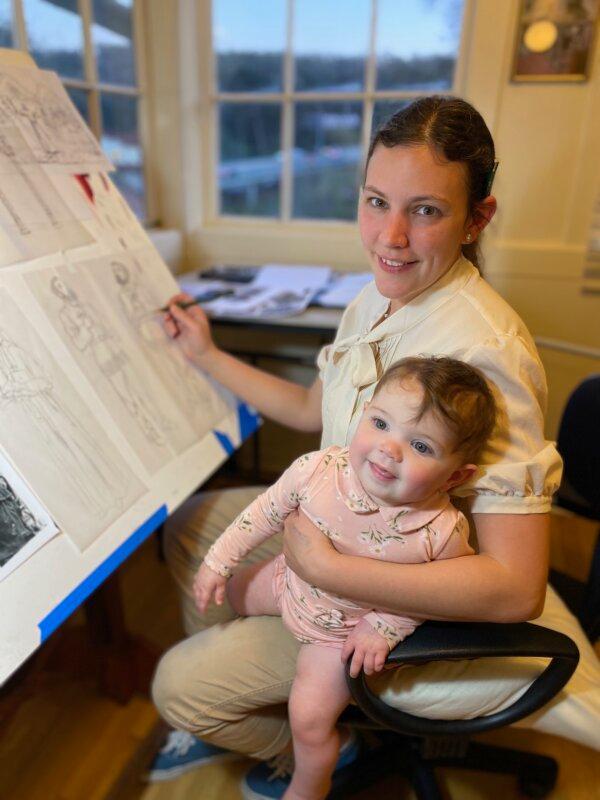 <span data-sheets-root="1" data-sheets-value="{"1":2,"2":"San Francisco-based illustrator Bernadette Carstensen in her studio in 2021 with Fiona, one of her five young children, some of whom have been featured in her sacred illustrations. (Courtesy of Bernadette Carstensen)"}" data-sheets-userformat="{"2":2819,"3":{"1":0},"4":{"1":2,"2":16776960},"11":4,"12":0,"14":{"1":2,"2":0}}">San Francisco-based illustrator Bernadette Carstensen in her studio in 2021 with Fiona, one of her five young children, some of whom have been featured in her sacred illustrations. (Courtesy of Bernadette Carstensen)</span>