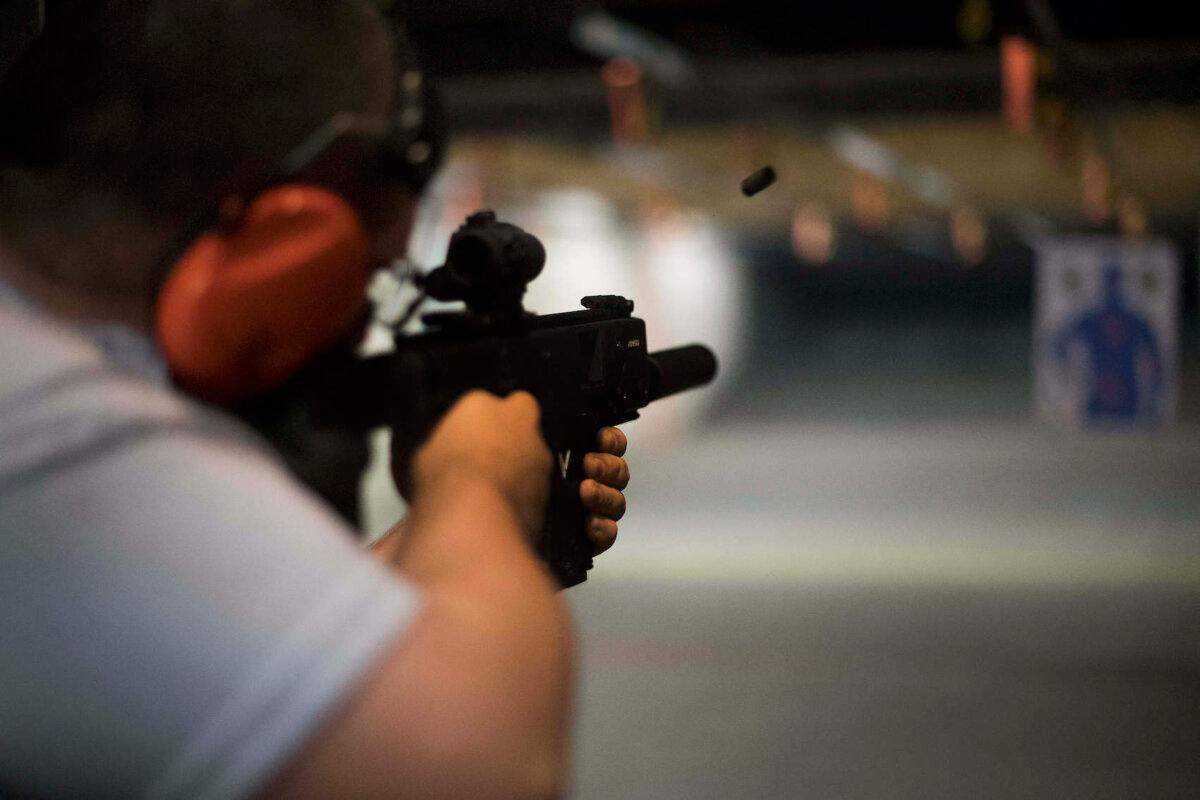 A recreational shooter fires his gun at the Lynchburg Arms & Indoor Shooting Range in Lynchburg, Va., on Oct. 20, 2017. (Jim Watson/AFP via Getty Images)