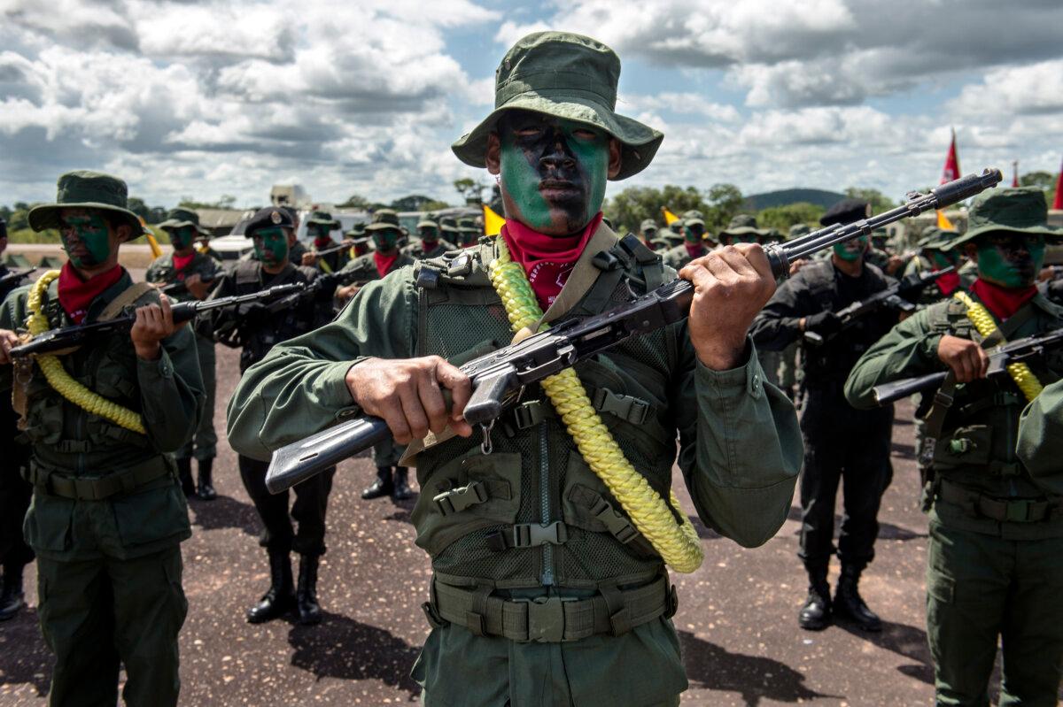 Members of the Venezuelan Army Special Forces take part in a military parade in Tumeremo, Venezuela, about 56 miles from the border with Guyana on July 21, 2015. (FEDERICO PARRA/AFP via Getty Images)