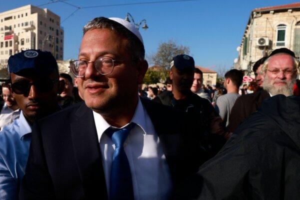 Itamar Ben Gvir, Israel's Minister of National Security and leader of the far-right Otzma Yehudit (Jewish Power) party, arrives to visit Jerusalem's Mahane Yehuda market on December 30, 2022. (Menahem Kahana / AFP)