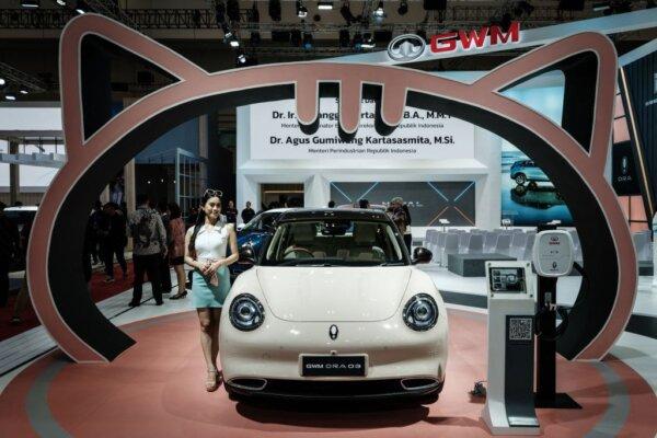Chinese automobile manufacturer Great Wall Motor (GWM) displays the new compact electric vehicle "ORA Good Cat 03" during the 30th Gaikindo Indonesia International Auto Show (GIIAS) at the Indonesia Convention Exhibition (ICE) in Tangerang on Aug. 10, 2023. (Yasuyoshi Chiba/AFP via Getty Images)