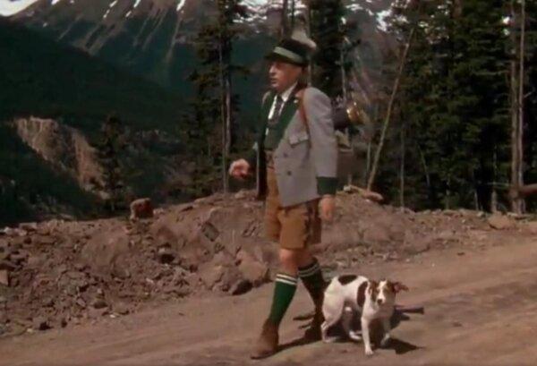 Virgil Smith (Bing Crosby) walks with his dog Buttons on the Austrian countryside, in "The Emperor Waltz." (Paramount Pictures)