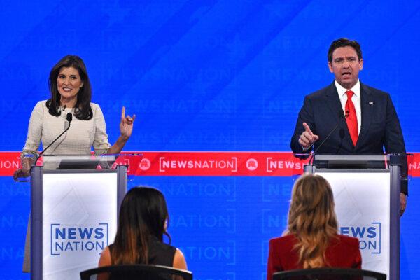Florida Governor Ron DeSantis (R) and former Governor from South Carolina and UN ambassador Nikki Haley gesture as they participate in the fourth Republican presidential primary debate at the University of Alabama in Tuscaloosa, Alabama, on December 6, 2023. (Jim Watson/AFP)