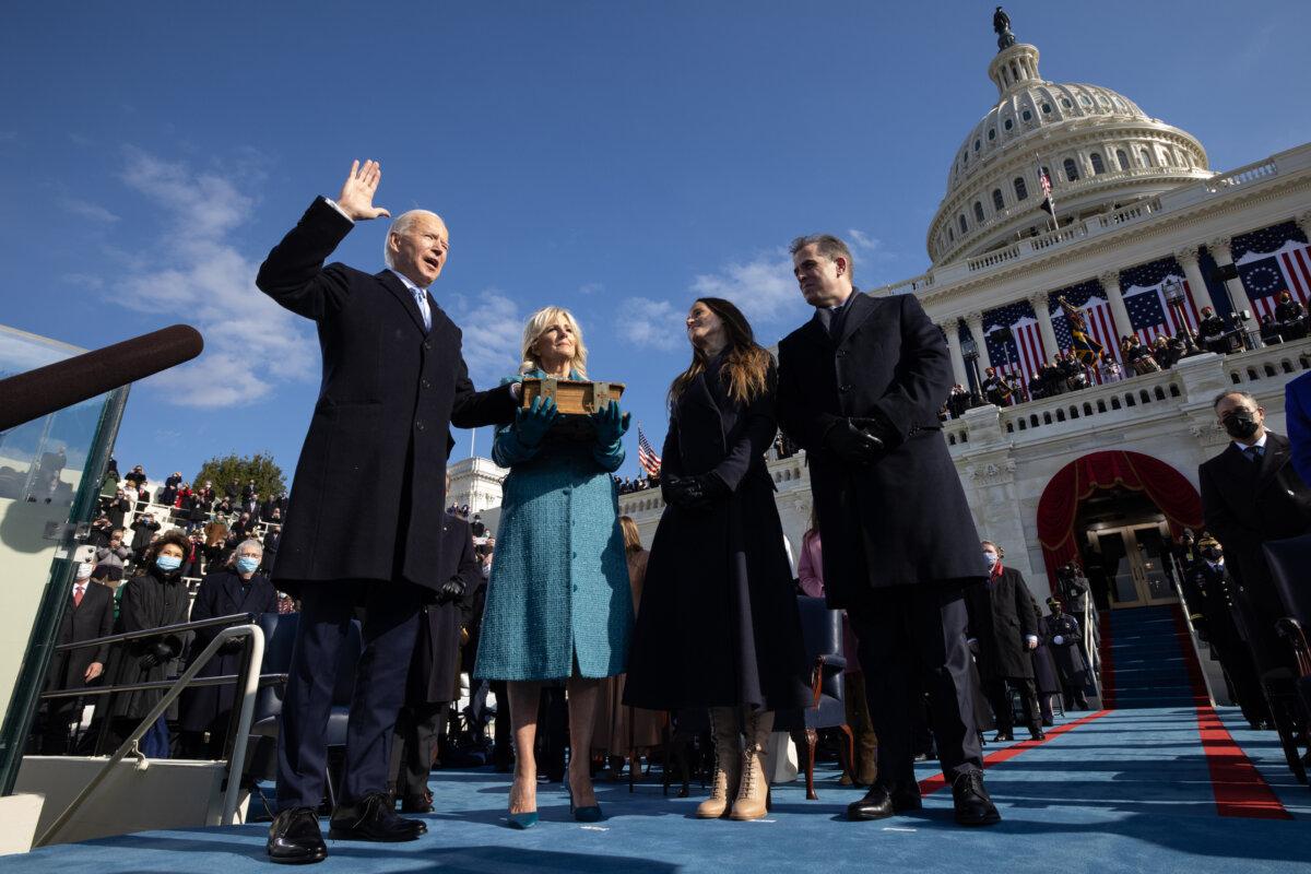 President Joe Biden, joined by First Lady Jill Biden and their children Ashley Biden and Hunter Biden, takes the oath of office as President of the United States on Jan. 20, 2021, during the 59th Presidential Inauguration at the U.S. Capitol. (Chuck Kennedy/White House, Public Domain)