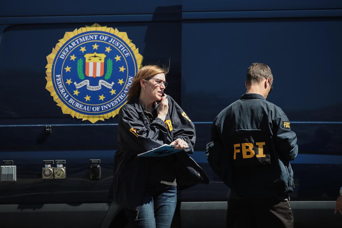FBI agents investigate a case in Sunset Valley, Texas, on March 20, 2018. (Scott Olson/Getty Images)
