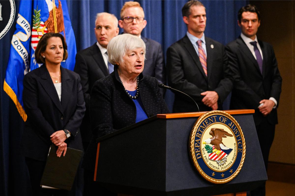 Treasury Secretary Janet Yellen speaks at a press conference while Justice Department and other officials look on, at the Justice Department in Washington on Nov. 21, 2023. (Mandel Ngan/AFP via Getty Images)