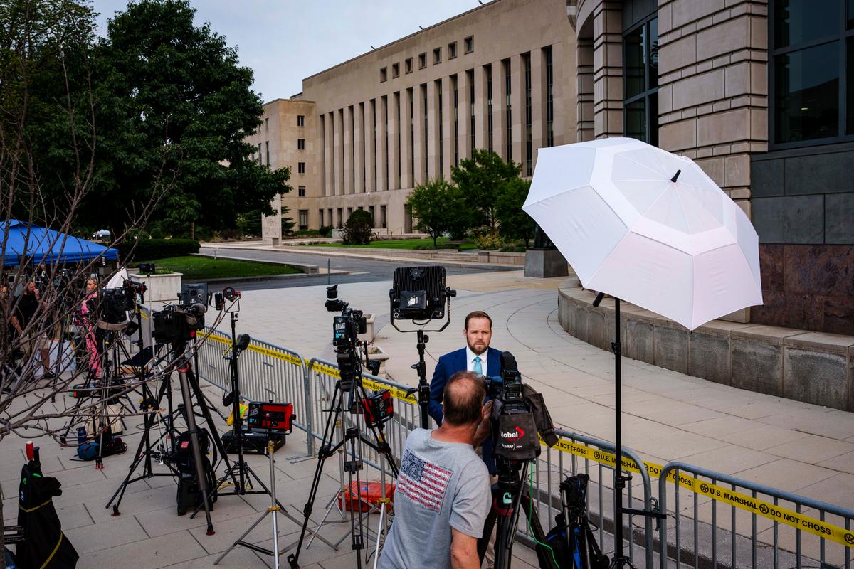  WASHINGTON, DC - AUGUST 3: Members of the press work outside of the E. Barrett Prettyman United States Courthouse on August 3, 2023 in Washington, DC. Former U.S. President Donald Trump is scheduled to be arraigned this afternoon after being indicted on four felony counts for his alleged efforts to overturn the 2020 election. (Photo by Drew Angerer/Getty Images)