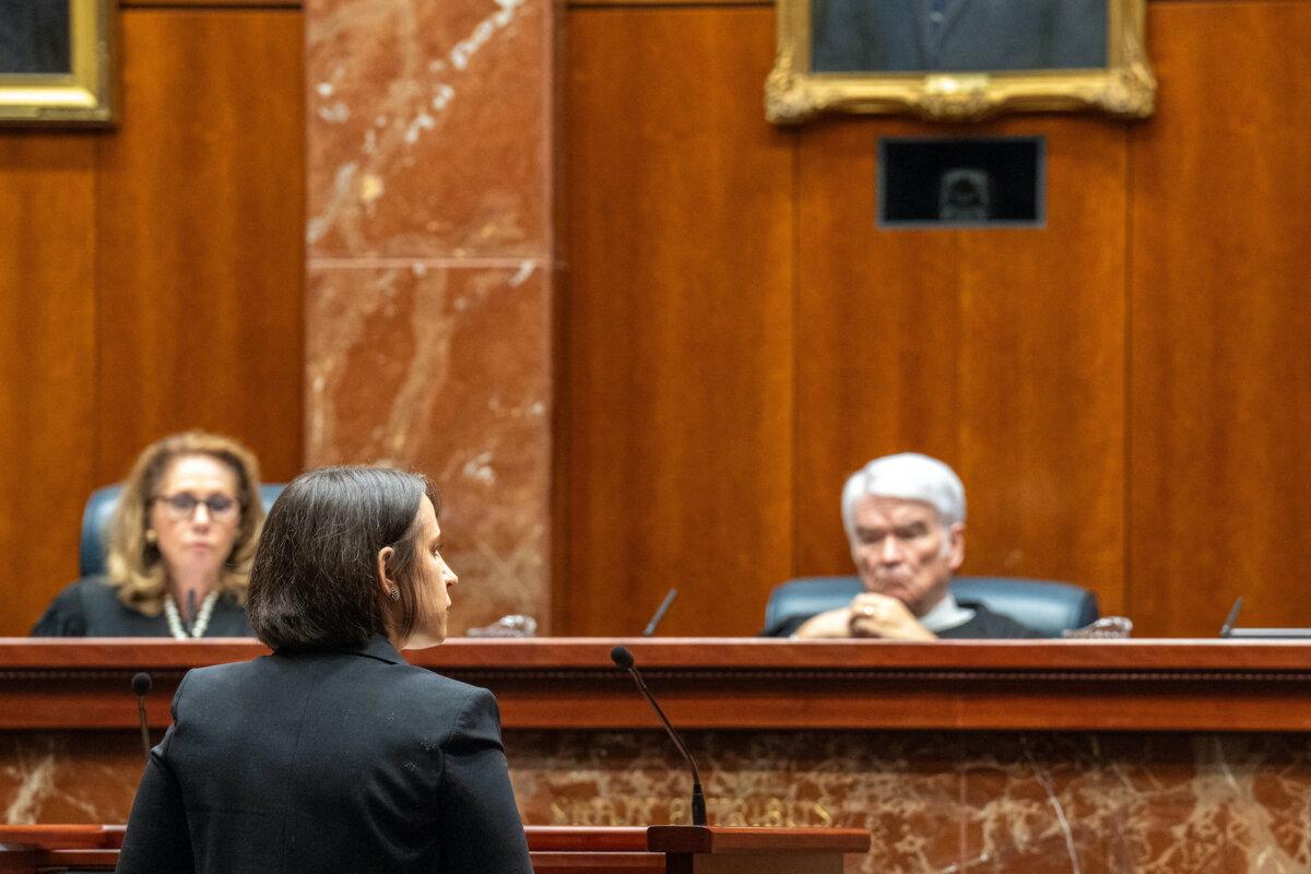 Center for Reproductive Rights attorney Molly Duane speaks in the court room at the Texas Supreme Court in Austin, Texas, on Nov. 28, 2023. The Texas Supreme Court heard arguments Tuesday in a case brought on behalf of 22 women who were denied abortions even though they had serious complications with their pregnancies that were in some cases life-threatening. (Suzanne Cordeiro/AFP via Getty Images)