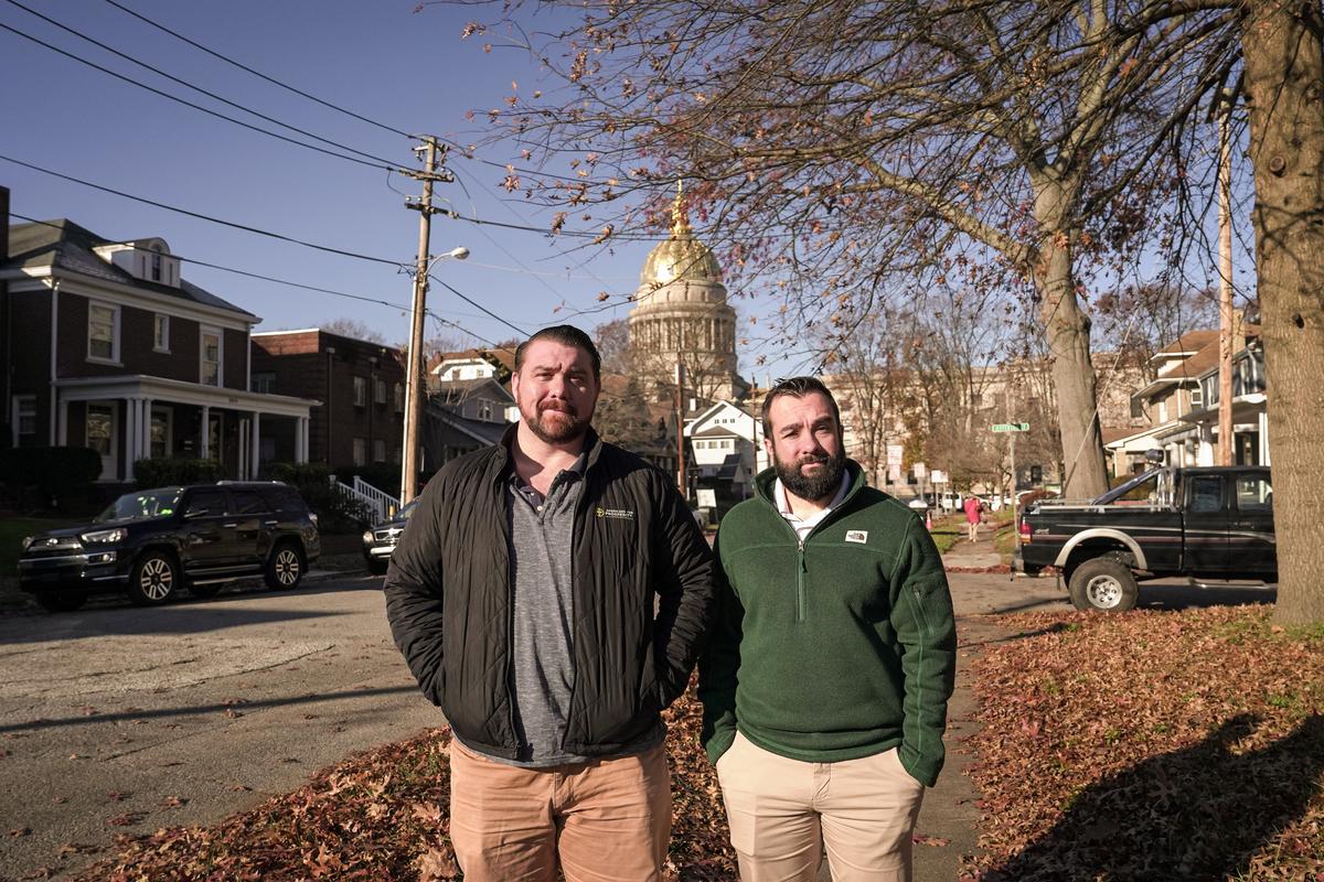 Jason Huffman (L), director for Americans for Prosperity in West Virginia, and Crescent Gallagher, deputy director, in Charleston, W.V., on Nov. 29, 2023. (Madalina Vasiliu/The Epoch Times)