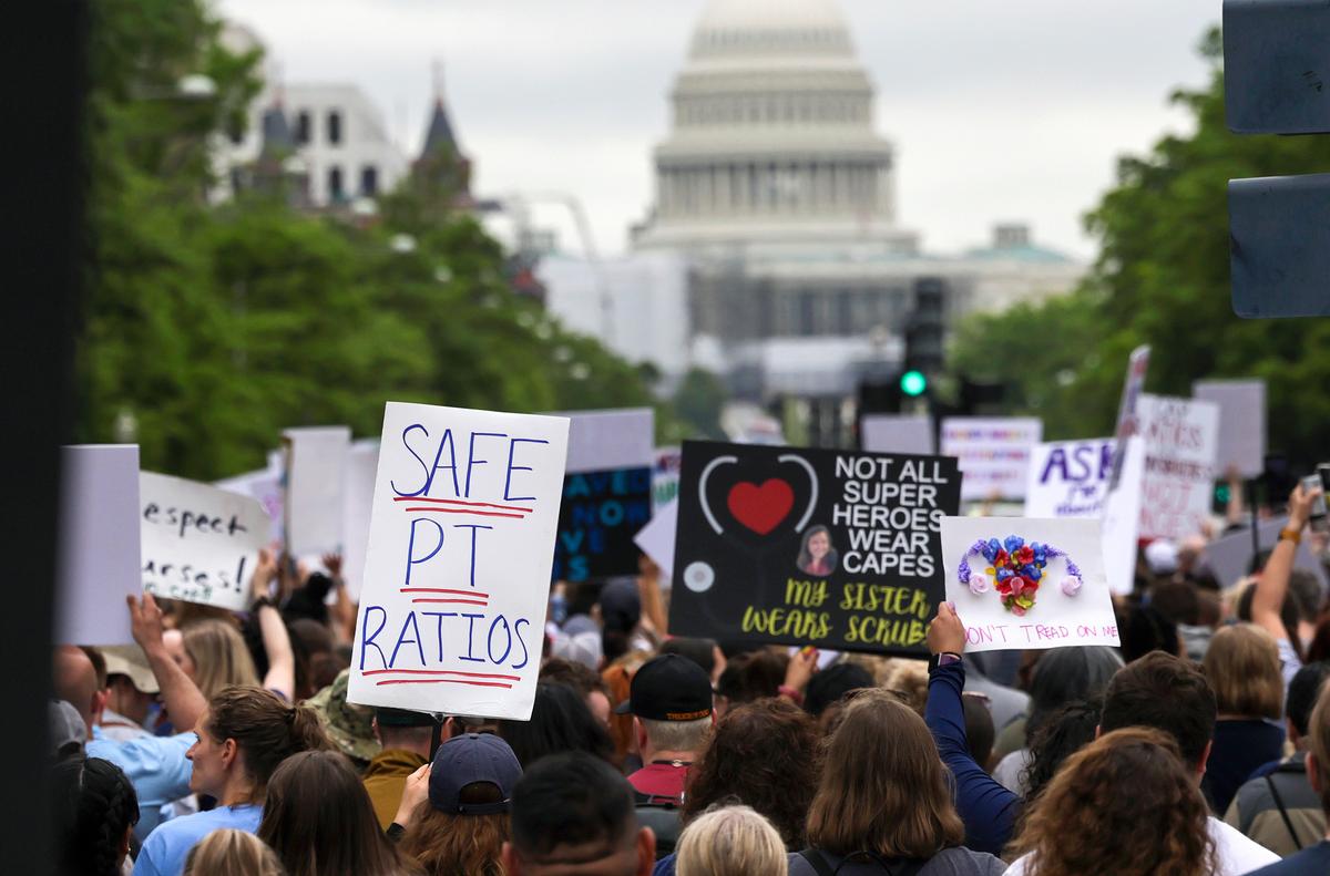  Nurses, medical professionals, and supporters rally to honor the lives and service of those lost as well as advocate for change in the nursing profession, in Washington on May 12, 2022. (Kevin Dietsch/Getty Images)