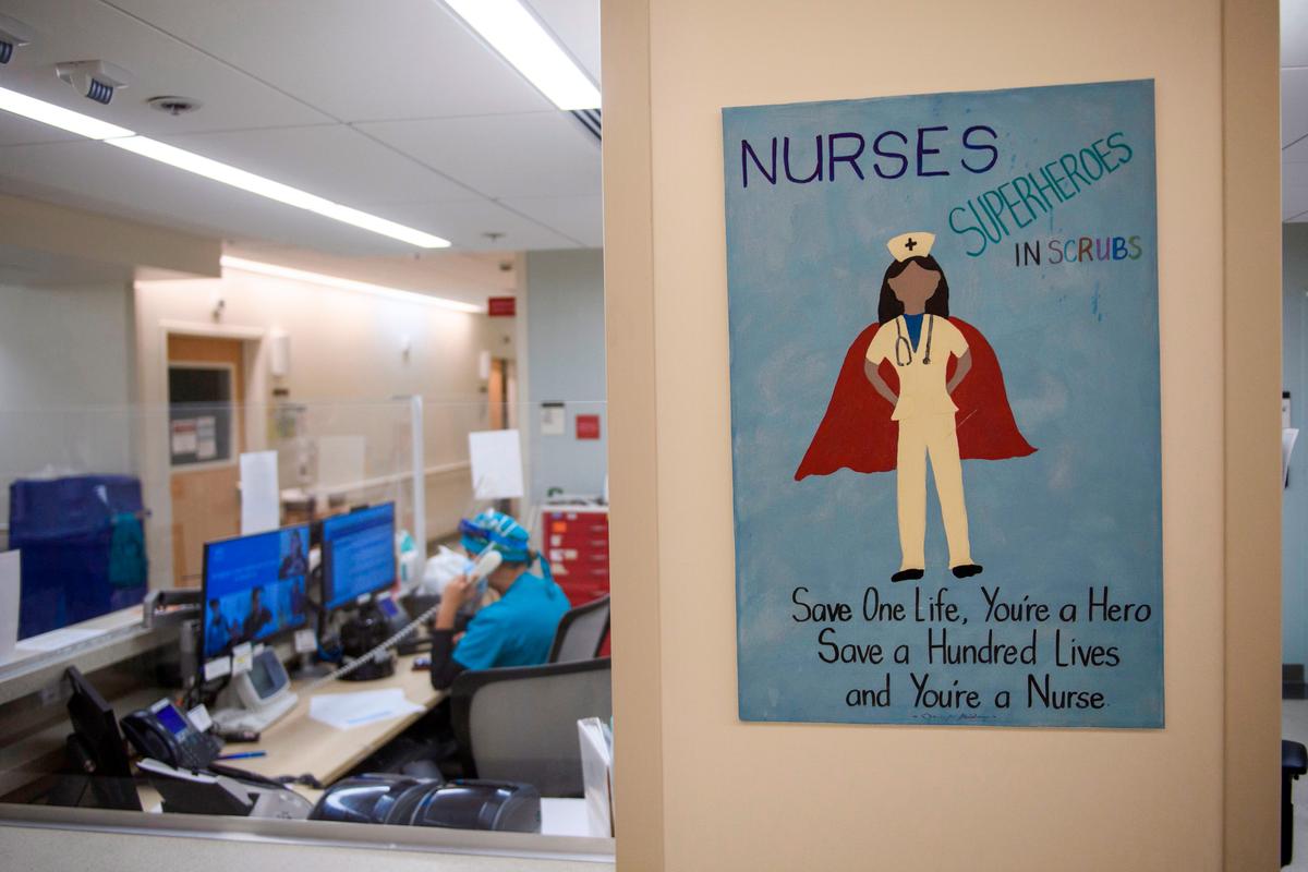  A poster in support of nurses hangs at a nurses station on a COVID-19 patient care floor at Martin Luther King Jr. Community Hospital in Los Angeles on Jan. 6, 2021. (Patrick T. Fallon/AFP via Getty Images)