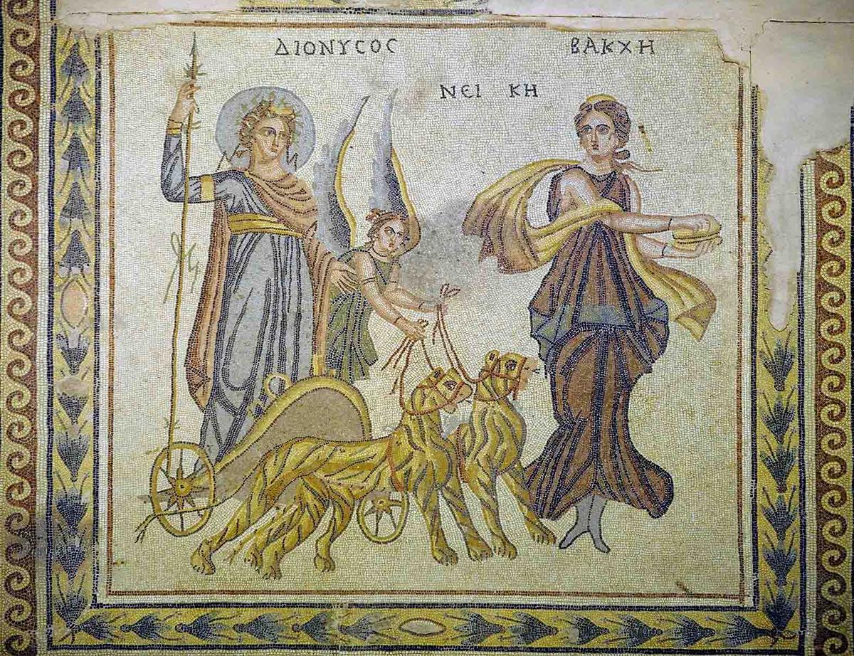 The god Dionysos with a winged Nike and a maenad. (<a href="https://en.wikipedia.org/wiki/File:Gaziantep_Zeugma_Museum_Dionysos_Triumf_mosaic_1875.jpg">Dosseman</a>/CC BY-SA 4.0)