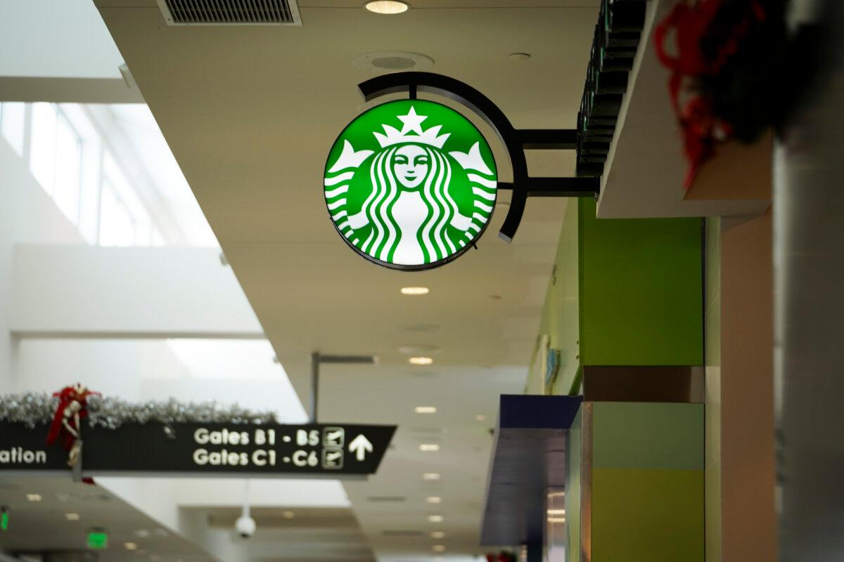 Starbucks to Cut 900 Jobs, Shutter Underperforming Stores 2 A Starbucks coffee sign at Birmingham Shuttlesworth International Airport in Birmingham, Ala., on Dec. 7, 2023. (Madalina Vasiliu/The Epoch Times)