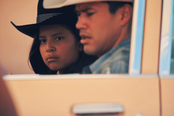 Benny (Keir Tallman, L) and his uncle Marvin (Martin Sensmeier) drive to the rodeo, in “Frybread Face and Me.” (Indion Entertainment/Array Releasing)