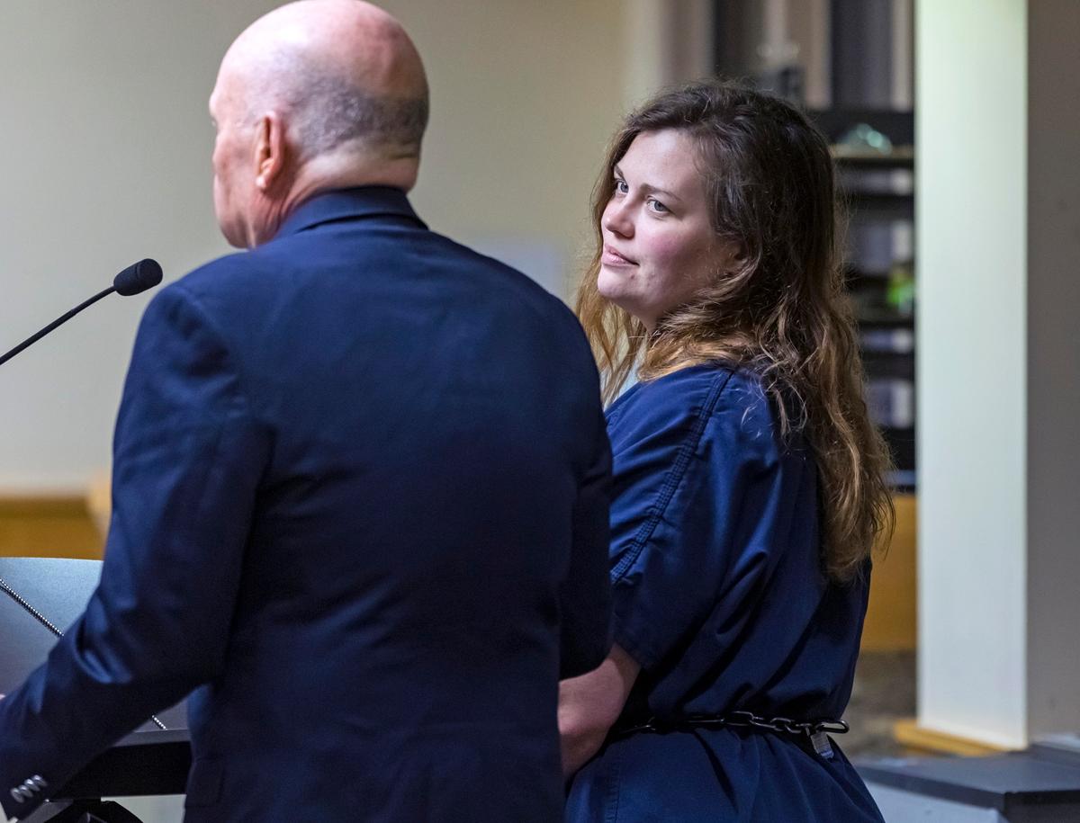 Hannah Roemhild (R), who is accused of driving through checkpoints outside President Donald Trump's Florida home Mar-a-Lago, listens during her initial appearance hearing in West Palm Beach, Fla., on Feb. 3, 2020. (Lannis Waters/The Palm Beach Post via AP)
