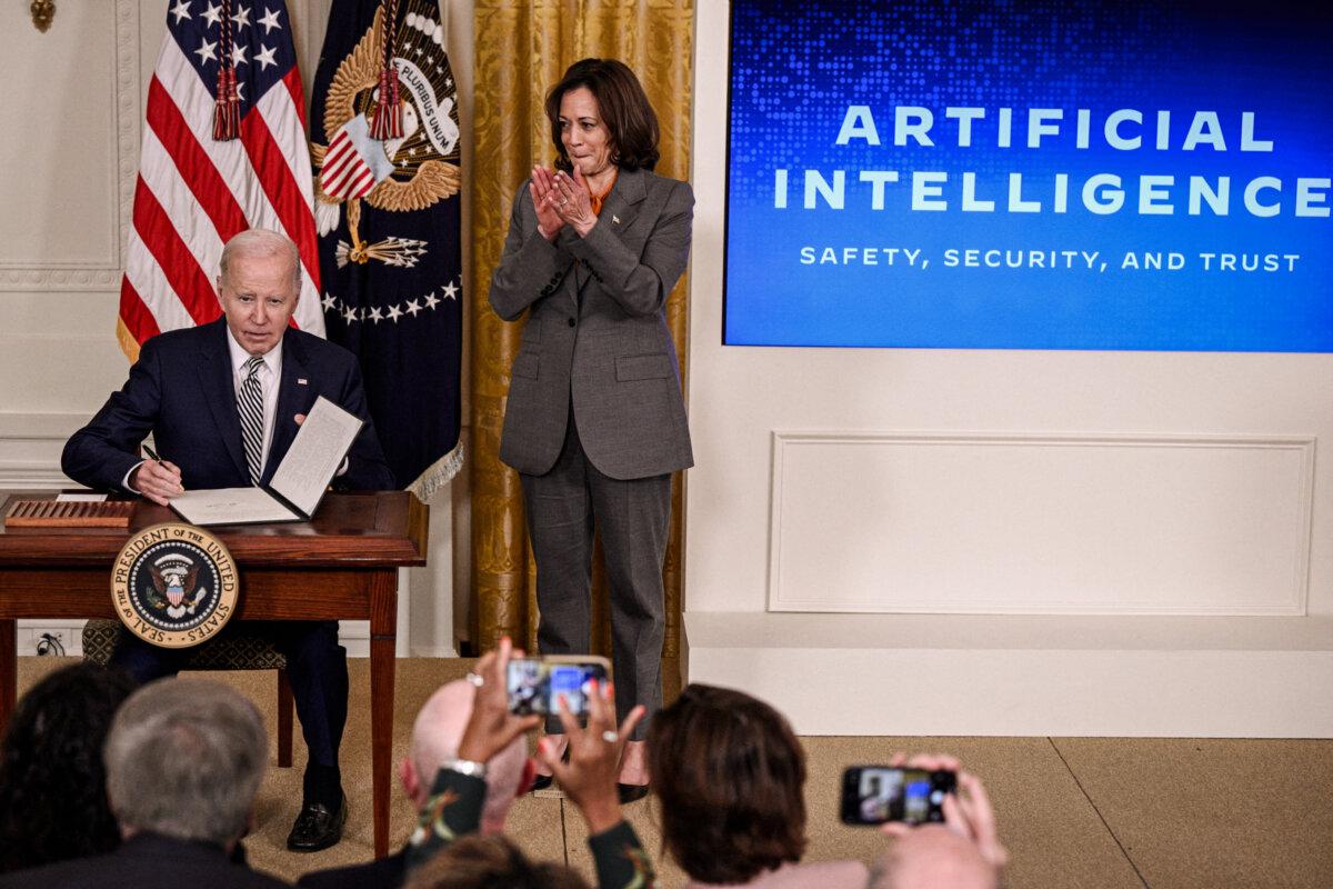 Vice President Kamala Harris applauds as President Joe Biden signs an executive order after delivering remarks on advancing the safe, secure, and trustworthy development and use of artificial intelligence, in the East Room of the White House in Washington, on Oct. 30, 2023. (Brendan Smialowski / AFP via Getty Images)