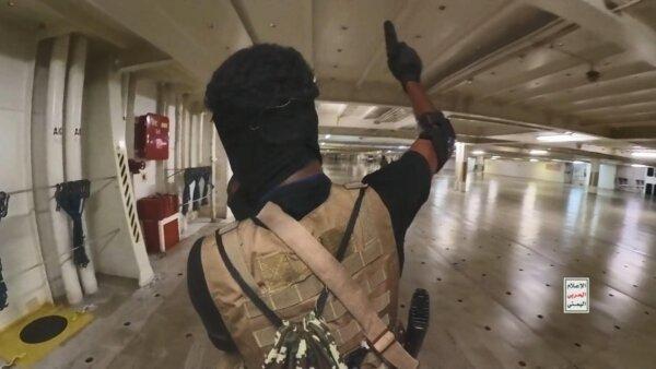 Iran Issues Warning Against US ‘Adventurism’ After Deploying Warship in Red Sea | USNN World News Yemen's Houthi fighters' takeover of the Galaxy Leader Cargo on the Red Sea coast off Hudaydah in the Red Sea, Yemen, on Nov. 20, 2023. (Houthi Movement via Getty Images)