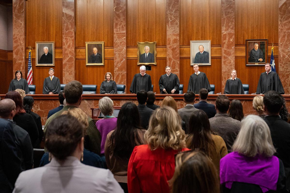(L–R) Justice Rebeca Aizpuru Huddle, Justice Brett Busby, Justice Debra Lehrmann, Chief Justice Nathan L. Hecht, Justice Jeff Boyd, Justice Jimmy Blacklock, Justice Jane Bland, and Justice Evan A. Young, of the Texas Supreme Court, arrive to hear litigators make their arguments in Zurowski v. State of Texas, at the Texas Supreme Court in Austin, Texas, on Nov. 28, 2023. (Suzanne Cordeiro/AFP via Getty Images)