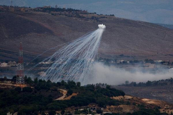 White phosphorus fired by the Israeli army to create a smoke screen is seen on the Israel–Lebanon border in northern Israel, on Nov. 12, 2023. (Evelyn Hockstein/Reuters)
