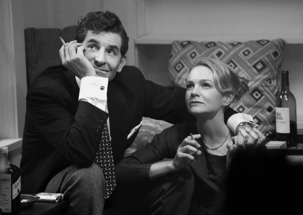 Leonard Bernstein (Bradley Cooper) and Felicia Montealegre (Carey Mulligan) in "Maestro." (Amblin Entertainment/Netflix)