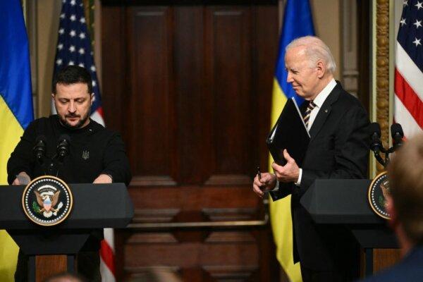 US President Joe Biden and Ukrainian President Volodymyr Zelensky leave after holding a press conference at the White House in Washington, DC on Dec. 12, 2023. (Mandel Ngan/AFP via Getty Images)
